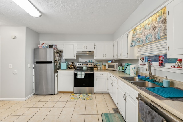 kitchen featuring white cabinetry, sink, and appliances with stainless steel finishes