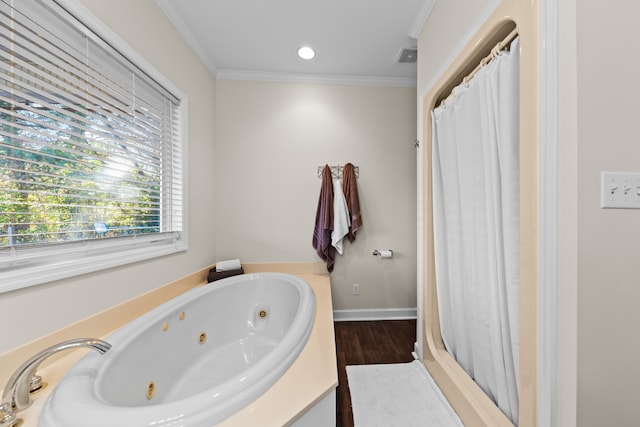 bathroom featuring hardwood / wood-style flooring, plus walk in shower, and ornamental molding