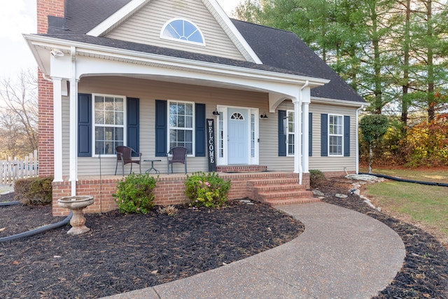 view of front of property featuring covered porch