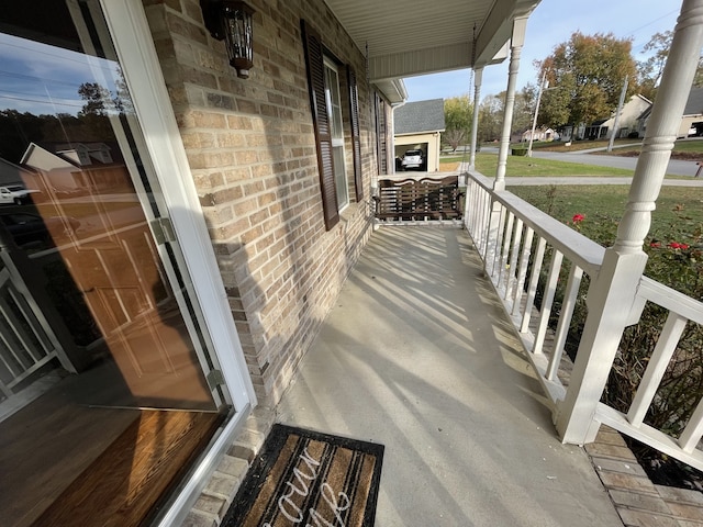 balcony featuring covered porch