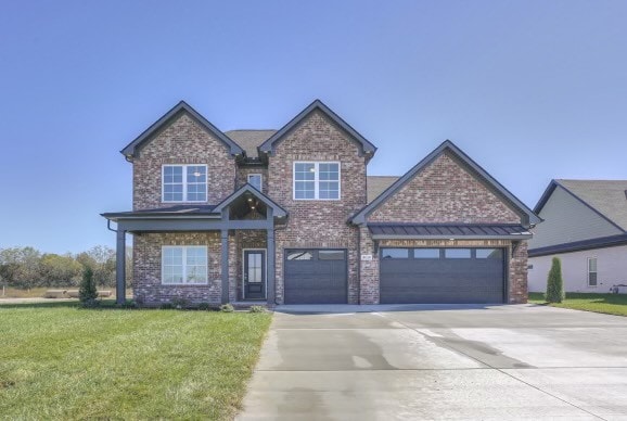 craftsman inspired home with a front yard