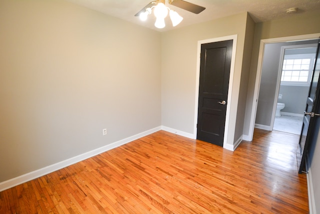 interior space with ceiling fan and light hardwood / wood-style floors