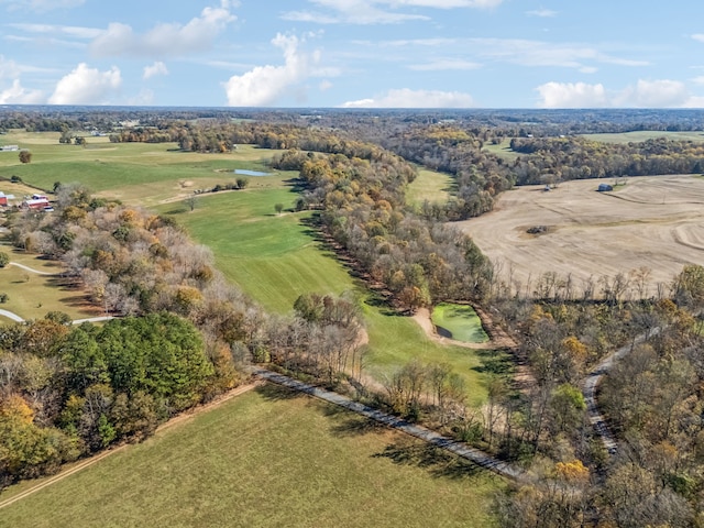 birds eye view of property with a rural view