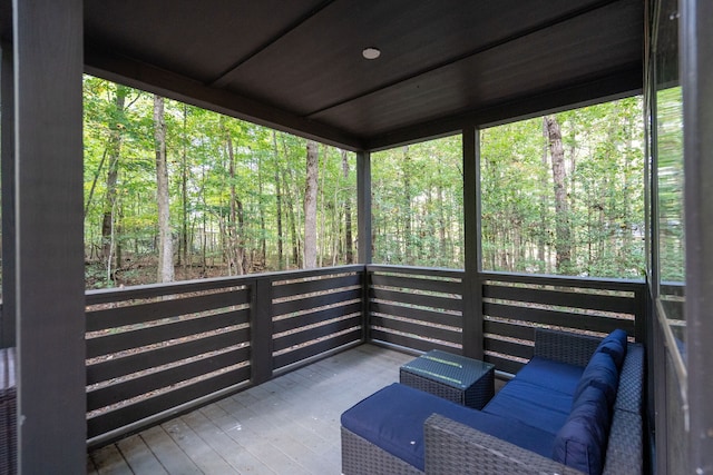 unfurnished sunroom with plenty of natural light