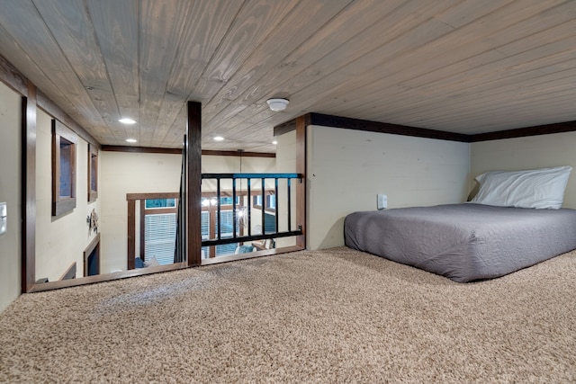 unfurnished bedroom with carpet flooring and wood ceiling