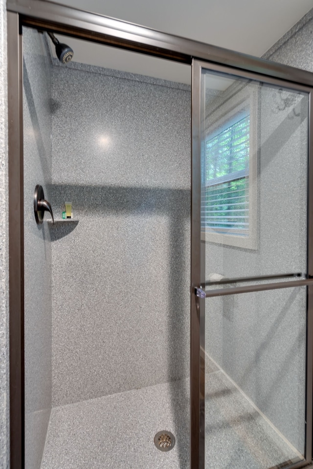 bathroom featuring walk in shower