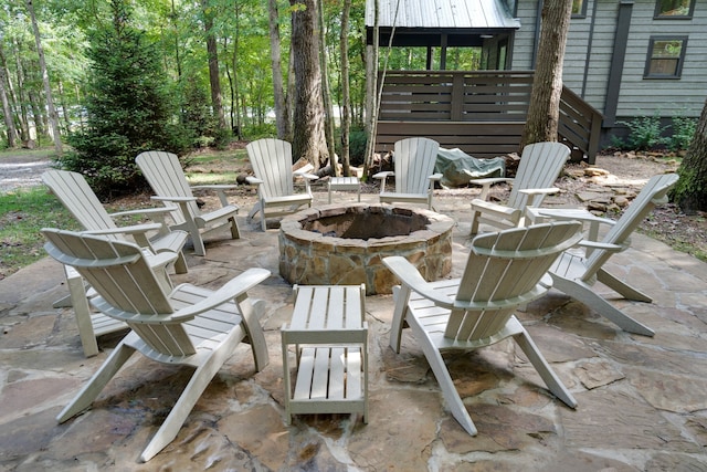 view of patio / terrace with an outdoor fire pit