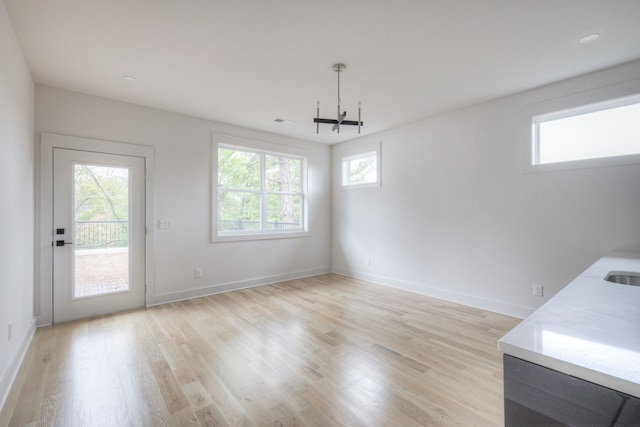 interior space with light hardwood / wood-style flooring