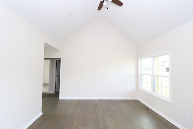 unfurnished room featuring dark hardwood / wood-style flooring, high vaulted ceiling, and ceiling fan