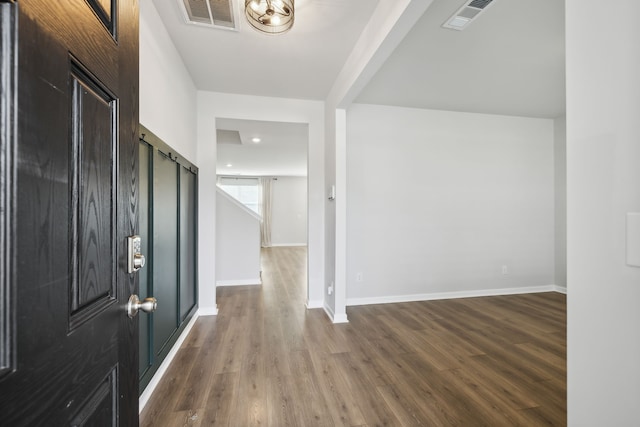 foyer entrance with wood-type flooring