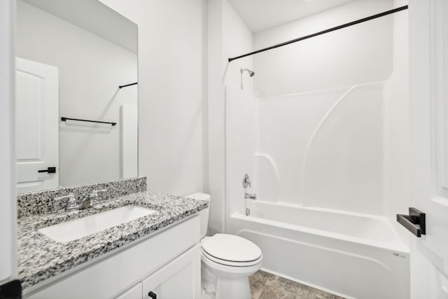 full bathroom with vanity, toilet, and shower / washtub combination