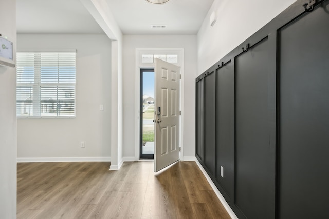 foyer with light hardwood / wood-style flooring