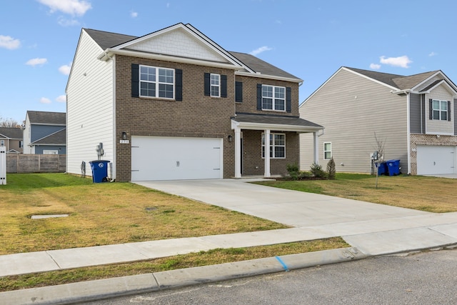 view of front of home featuring a front lawn and a garage