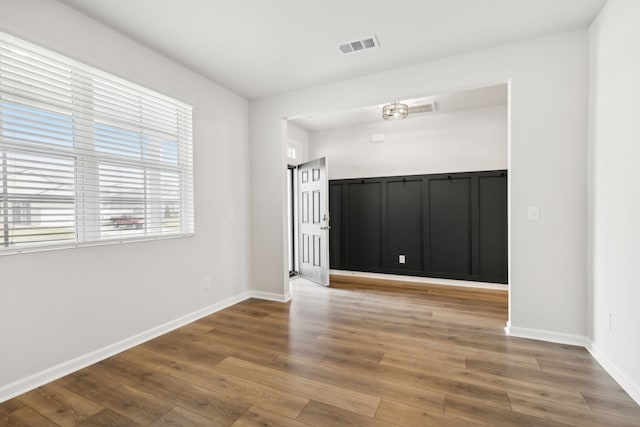 foyer with wood-type flooring