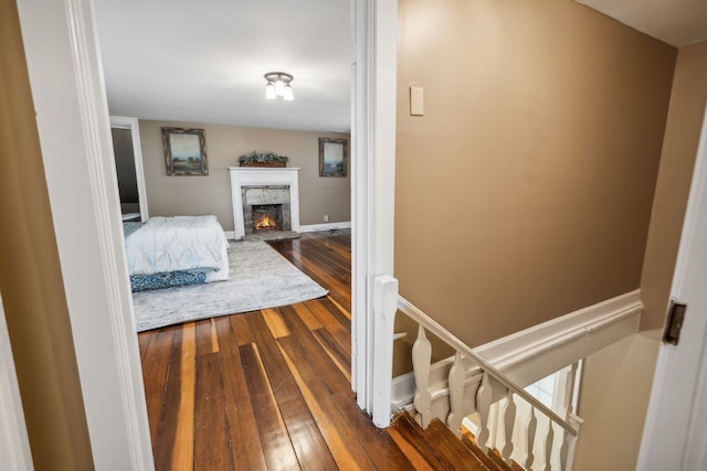 hallway with wood-type flooring