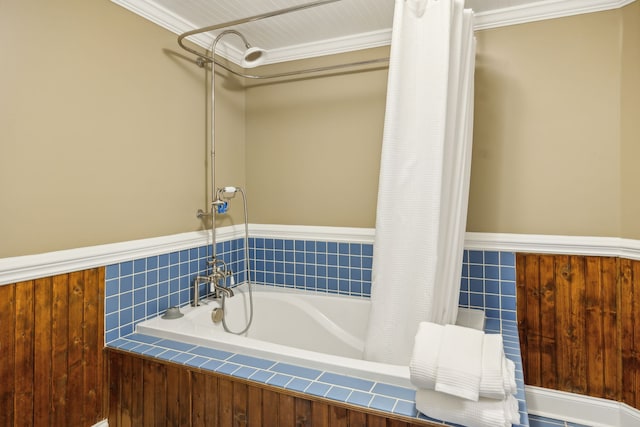 bathroom with crown molding and shower / tub combo