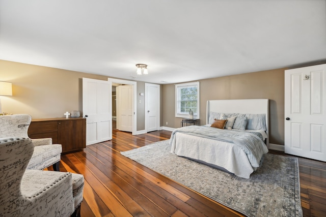 bedroom featuring dark hardwood / wood-style floors