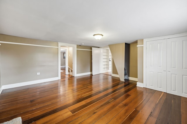 interior space with dark hardwood / wood-style flooring