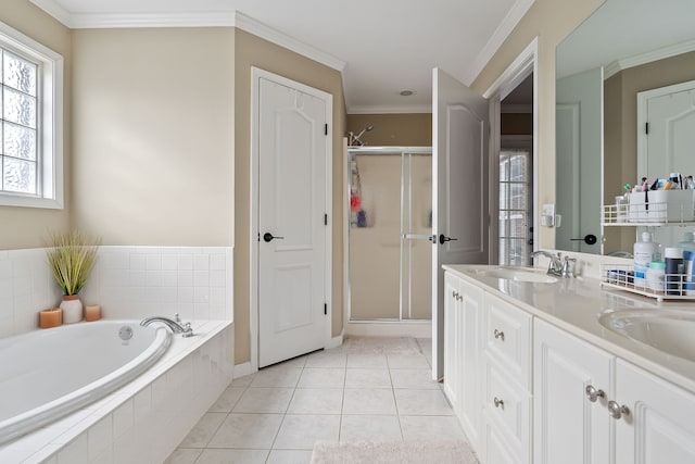 bathroom with tile patterned floors, vanity, plus walk in shower, and ornamental molding