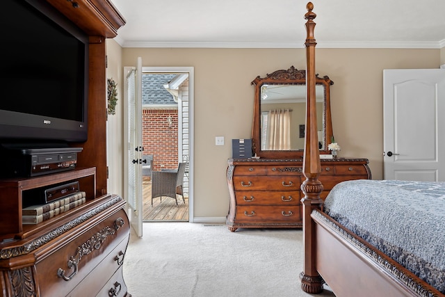 carpeted bedroom with crown molding