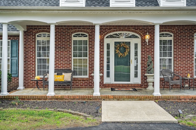 entrance to property with covered porch