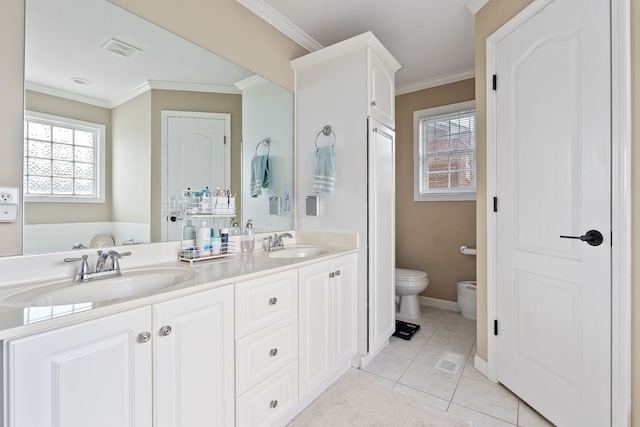 bathroom with vanity, a bathtub, tile patterned floors, toilet, and ornamental molding