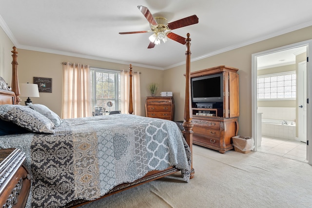 bedroom featuring light carpet, ensuite bath, ceiling fan, and crown molding