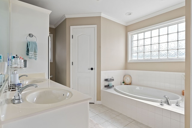 bathroom with tile patterned flooring, vanity, tiled bath, and ornamental molding