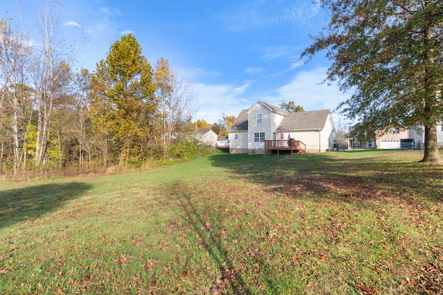 view of yard featuring a wooden deck