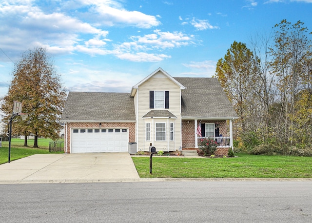 view of front property with a garage, a porch, and a front yard