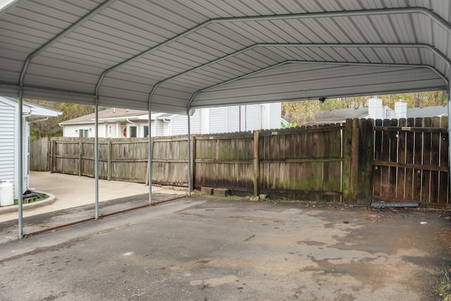 exterior space featuring a carport