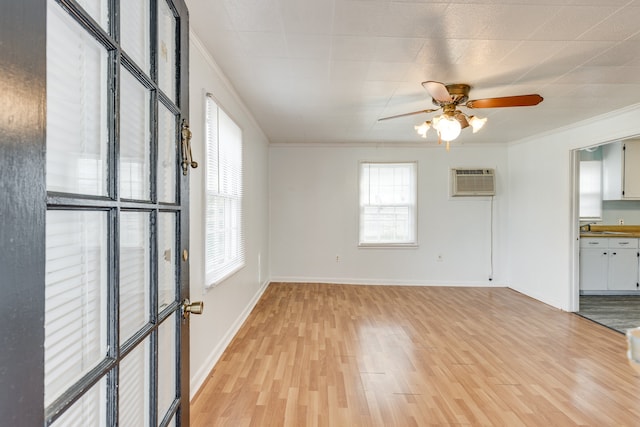 unfurnished room featuring light wood-type flooring, ceiling fan, and ornamental molding