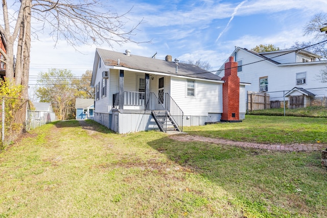 bungalow featuring a front yard