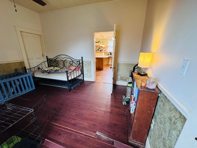 bedroom featuring dark wood-type flooring