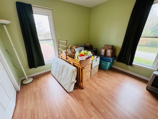 bedroom with light hardwood / wood-style flooring