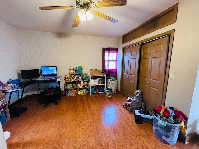 office space featuring hardwood / wood-style flooring and ceiling fan