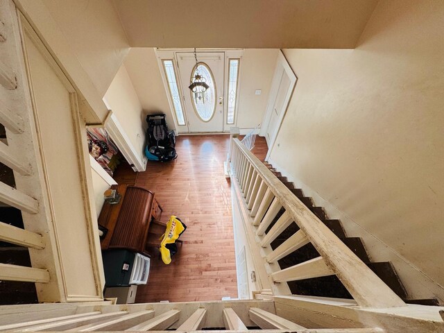 foyer entrance with hardwood / wood-style flooring