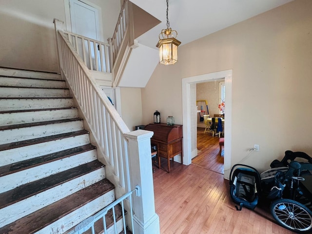 staircase featuring hardwood / wood-style flooring