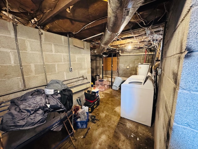 basement with washer / clothes dryer and water heater