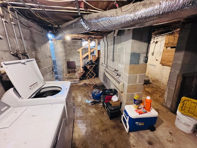 basement with washing machine and clothes dryer