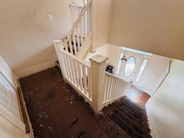 stairway with wood-type flooring