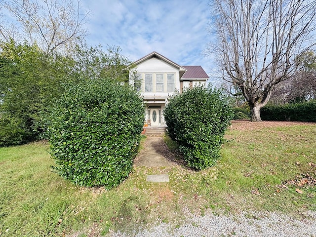 exterior space with a front lawn