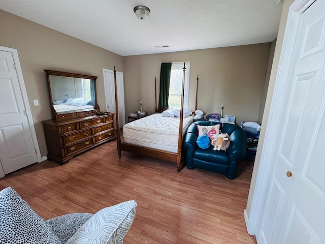 bedroom featuring light wood-type flooring