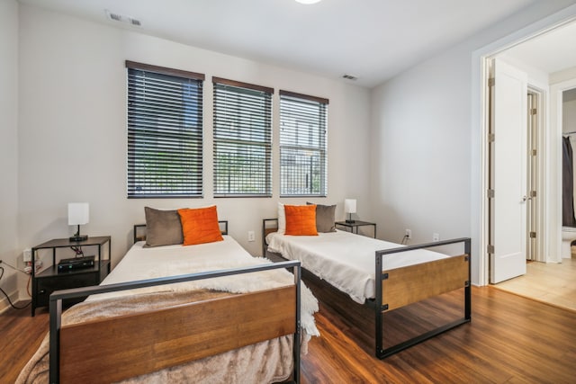 bedroom featuring hardwood / wood-style floors