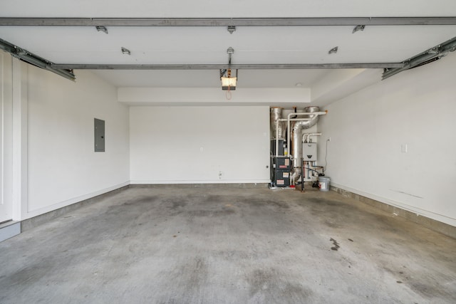 garage featuring a garage door opener and electric panel