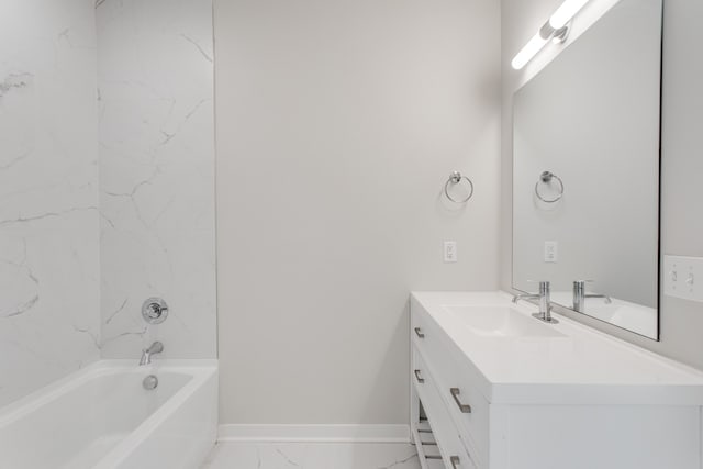 bathroom with vanity and tiled shower / bath combo