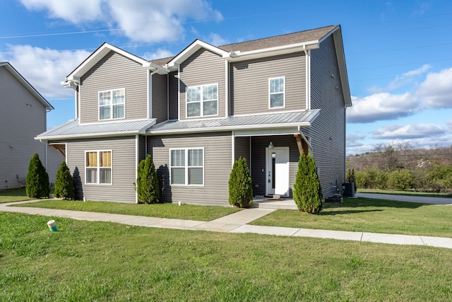 view of front of house with a front lawn