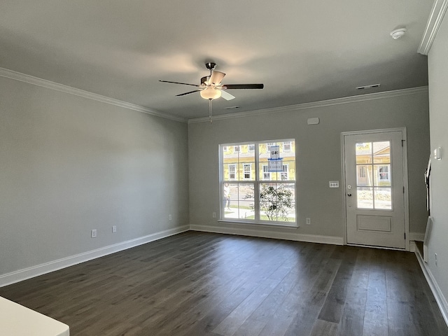 interior space with ceiling fan, dark hardwood / wood-style flooring, and ornamental molding