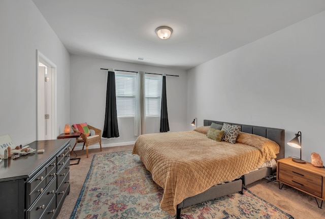 bedroom with light carpet