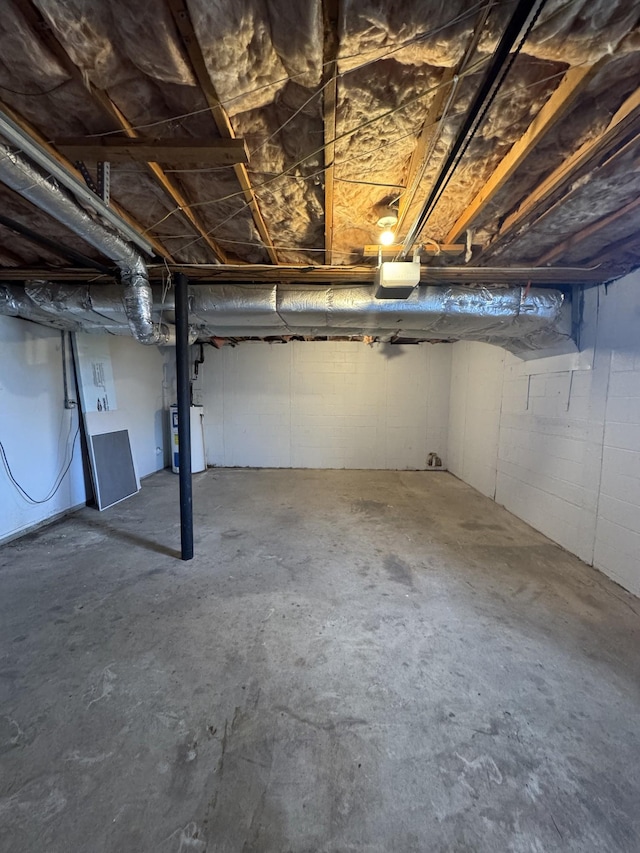 basement featuring electric water heater